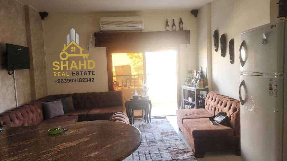 شقة للبيع ملبسة حجر بناء حديث باللاذقيه - اللاذقية