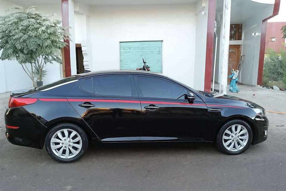 Kia Optima - طفس