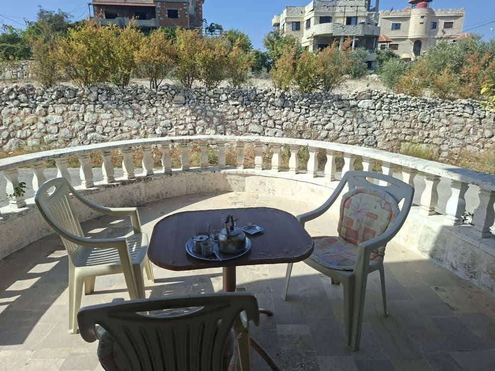 ارض 13 دونم مع بيت3 طوابق - منطقة الحفة - صورة 6