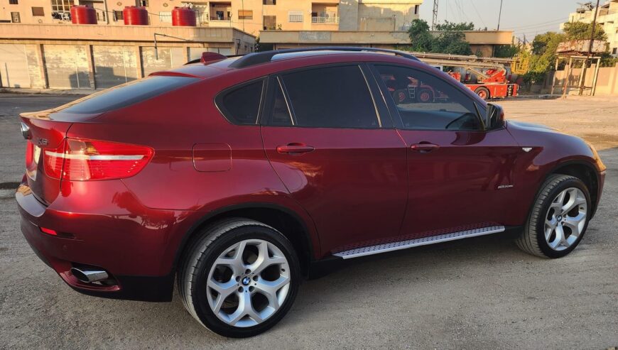 Bmw x6لون احمر